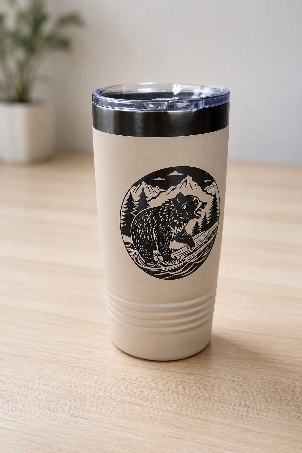 Tan powder-coated tumbler with Bear in the mountains design